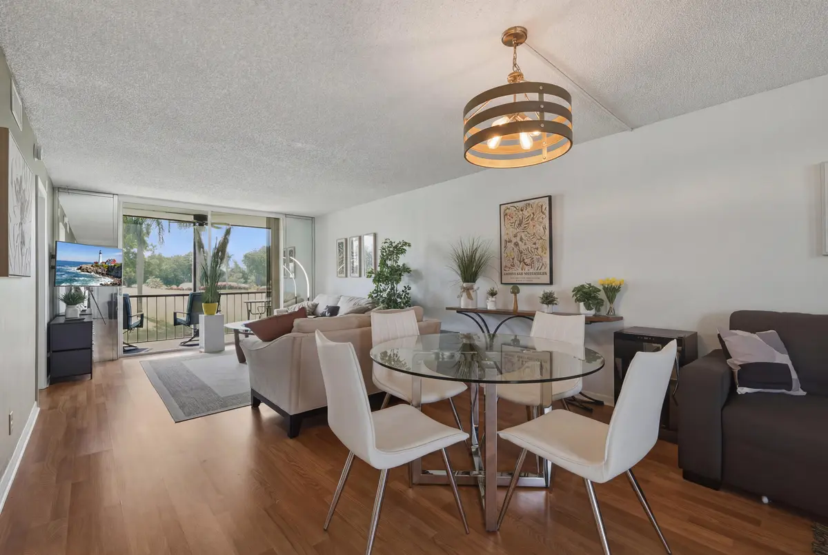 3. Dining Living Room Balcony at 9823 S Hollybrook Lake Drive 206, Pembroke Pines