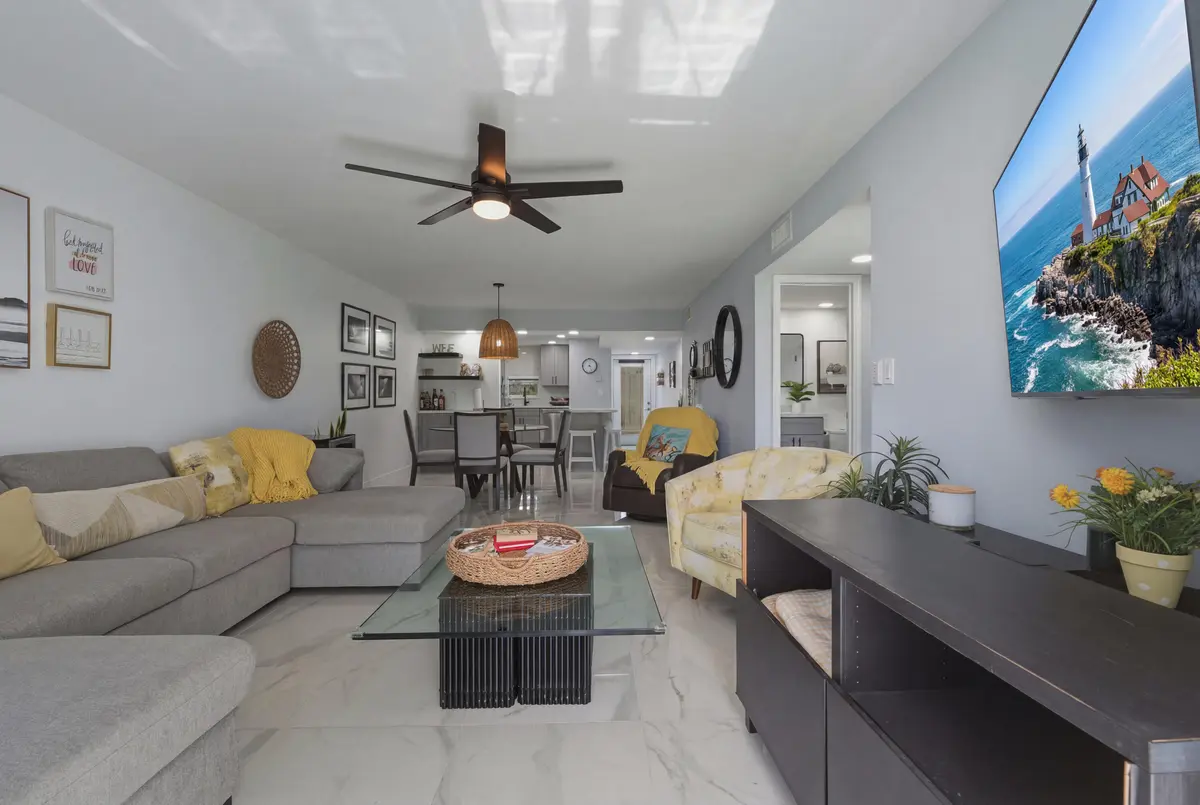 1. Living Room Dining Room Foyer at 9823 S Hollybrook Lake Drive 104, Pembroke Pines