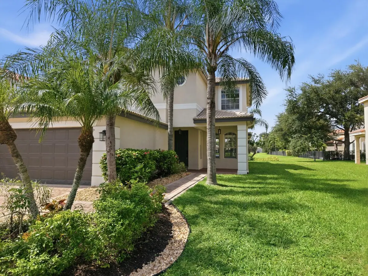 Lush Tropical Landscaping at 8895 CHESTNUT RIDGE Way, Boynton Beach