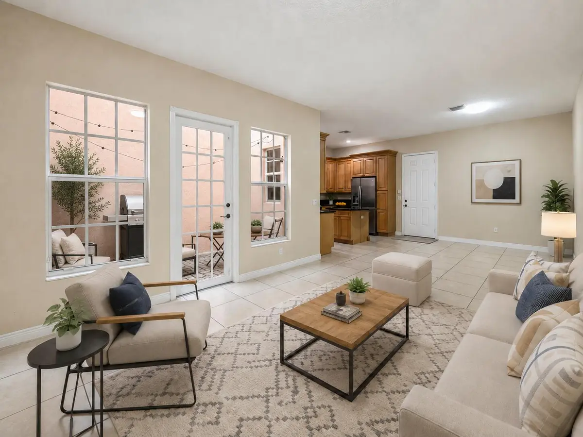 Living room Virtually Staged at 810 NW 83RD Lane, Boca Raton