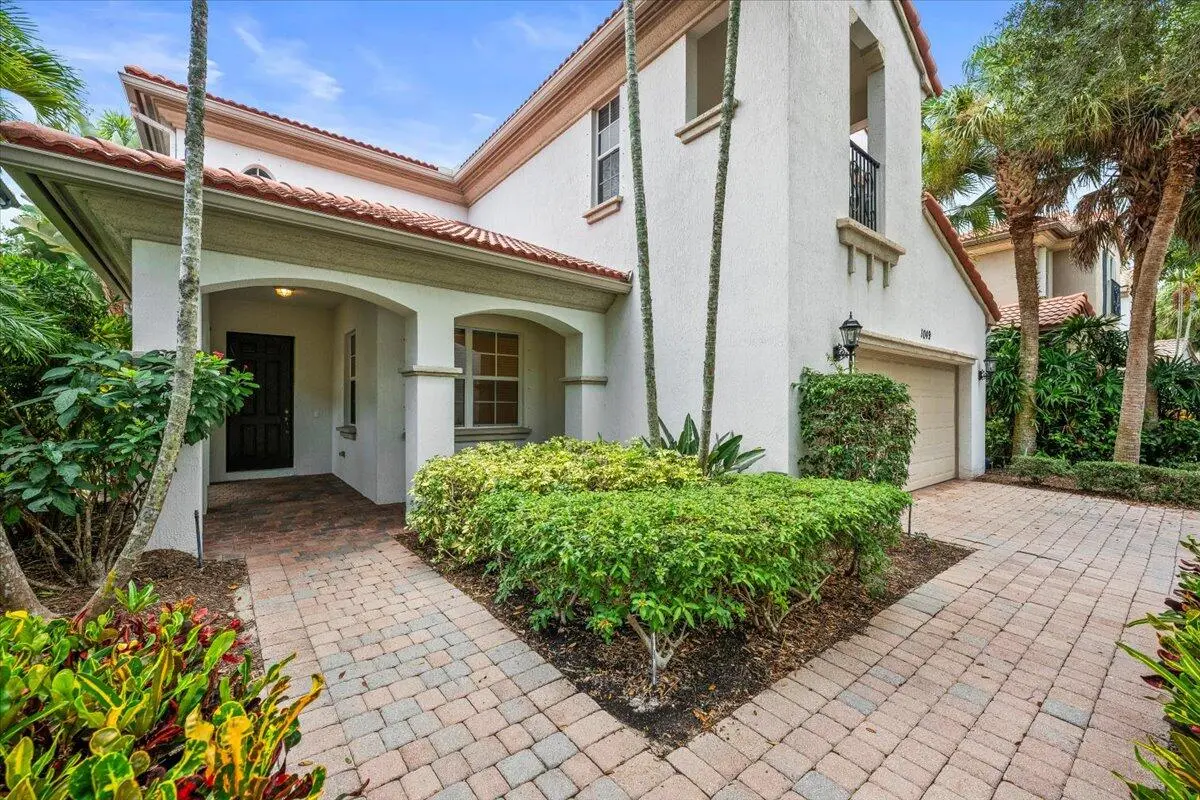 Inviting Path Entryway at 1049 Vintner Boulevard, Palm Beach Gardens