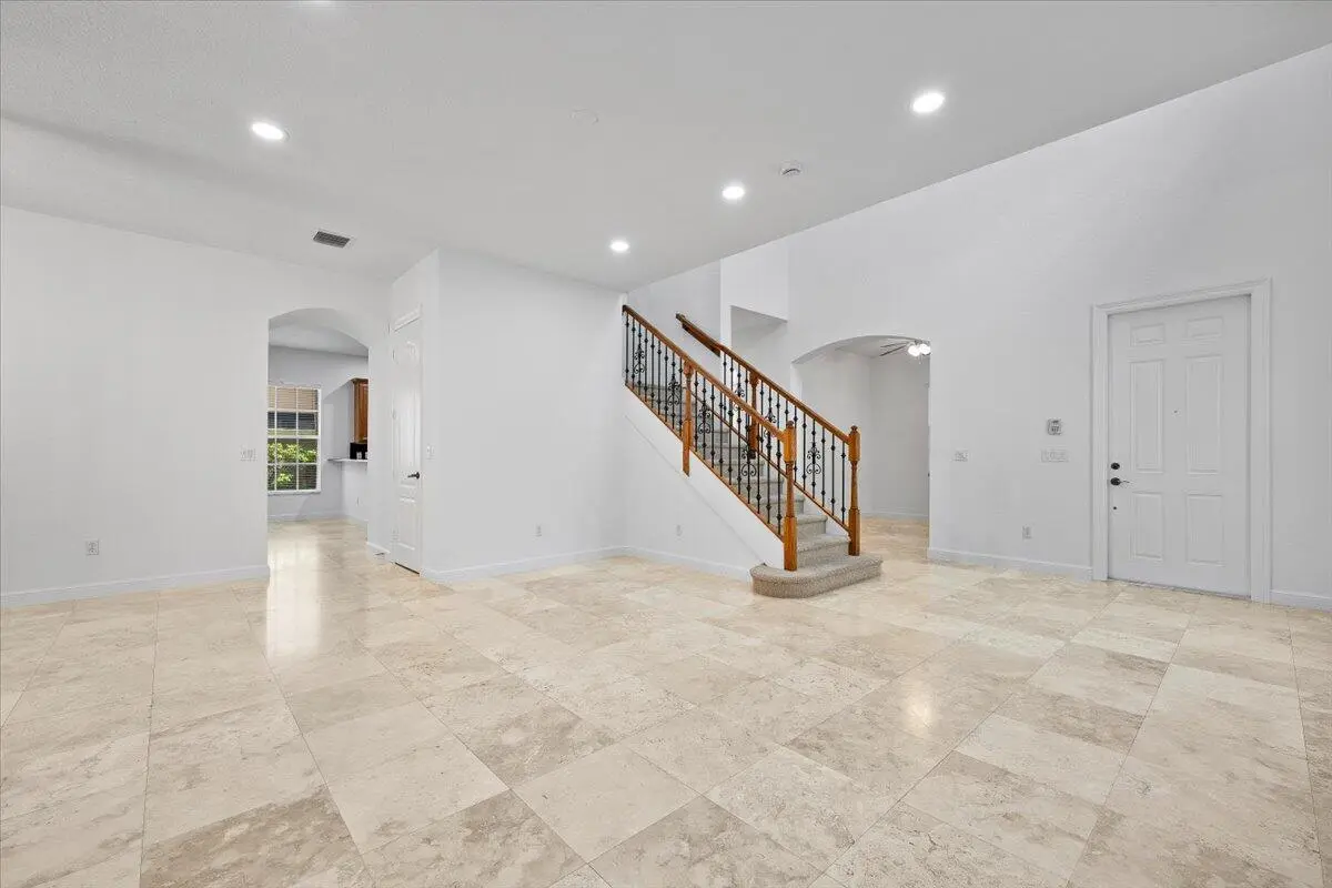 Grand Entrance (Living Room) at 1049 Vintner Boulevard, Palm Beach Gardens
