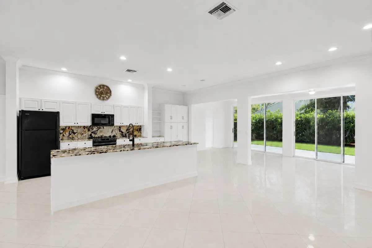 Kitchen w Bonus Room at 8914 Brittany Lakes Drive, Boynton Beach