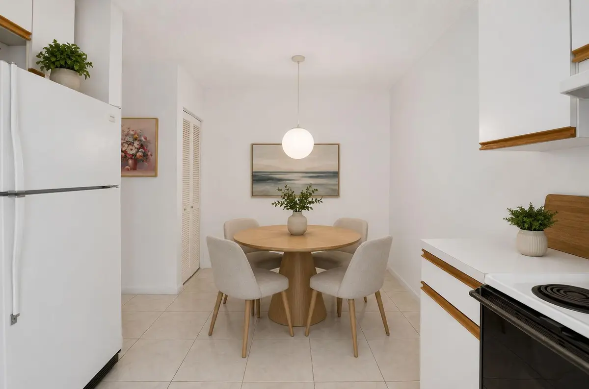 Virtually Staged Kitchen Dining Area at 5187 Europa Drive F, Boynton Beach
