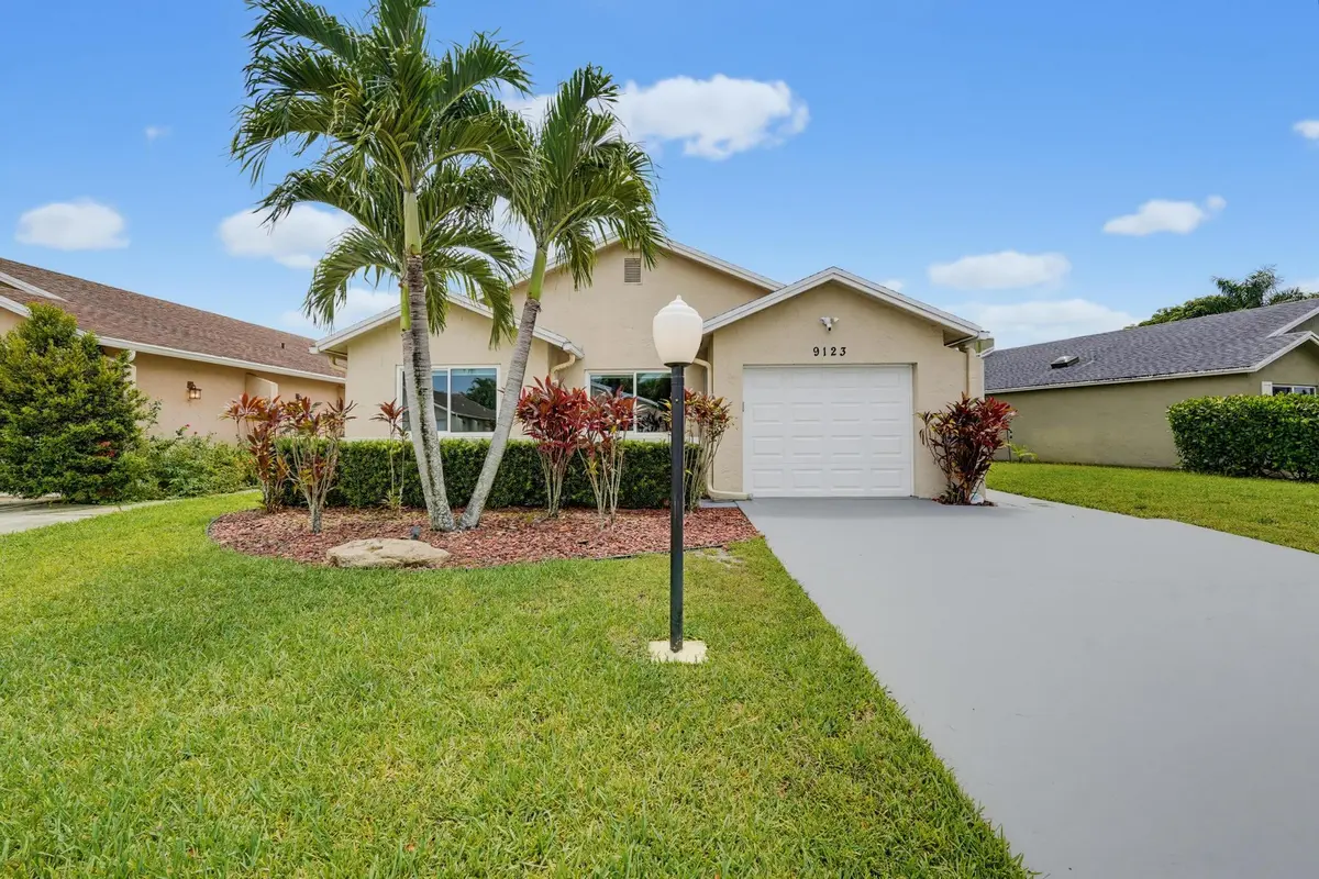 Front Elevation at 9123 PINE SPRINGS Drive, Boca Raton