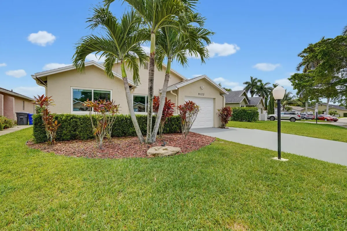 Front Elevation at 9123 PINE SPRINGS Drive, Boca Raton