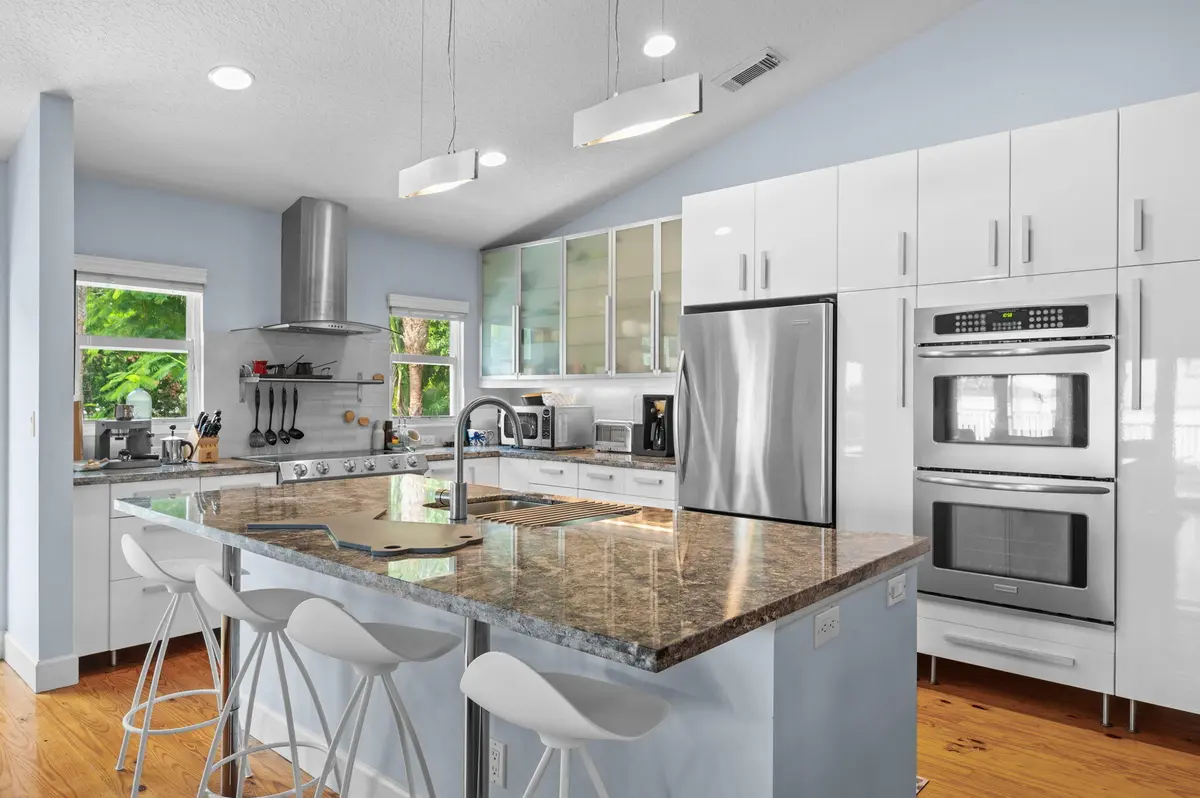 Kitchen w/ Island at 1790 NE MANGO Terrace, Jensen Beach
