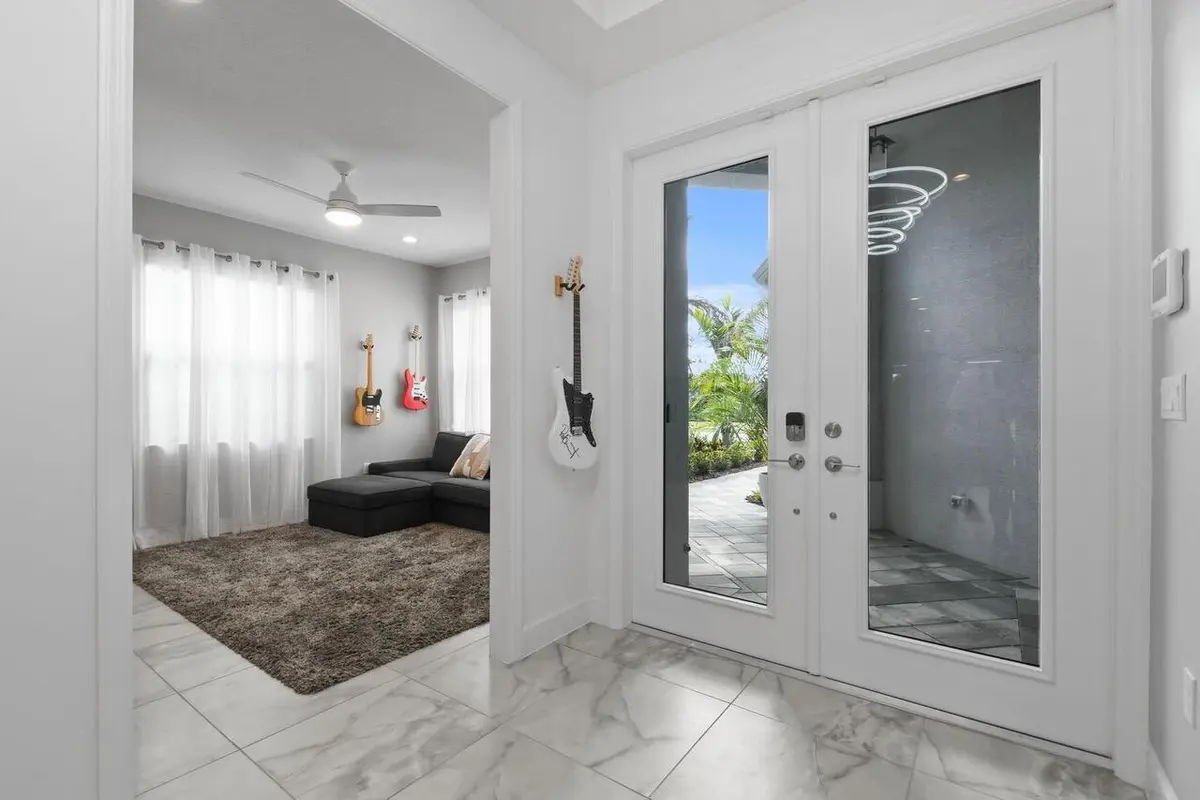 Impact glass front double doors at 12389 SW Water Dance Way, Port St. Lucie