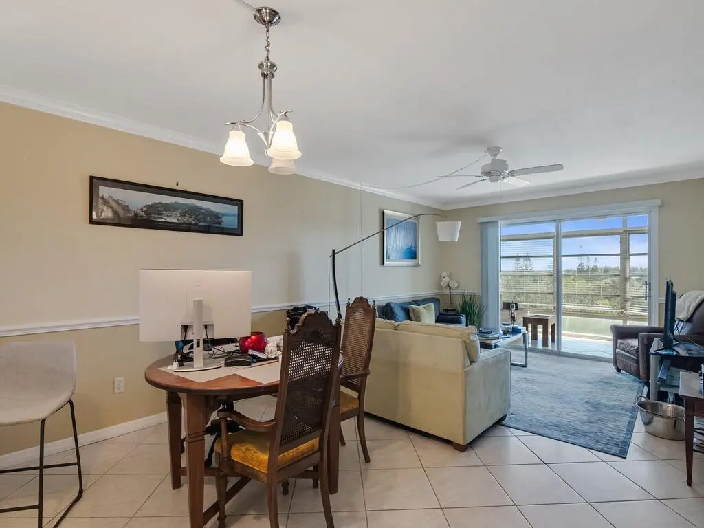 DINING AREA TO GREAT ROOM AND PORCH at 2333 Indian River Boulevard, Vero Beach