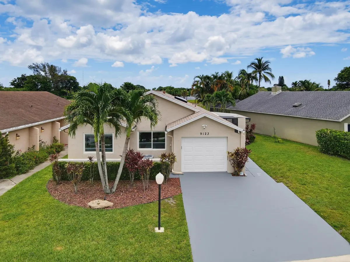 Front Elevation at 9123 PINE SPRINGS Drive, Boca Raton