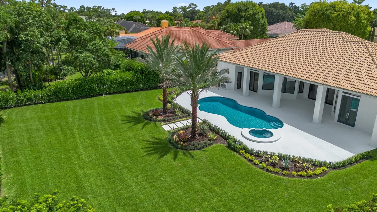Manicured private back yard at 1712 Mayacoo Lakes Boulevard, West Palm Beach