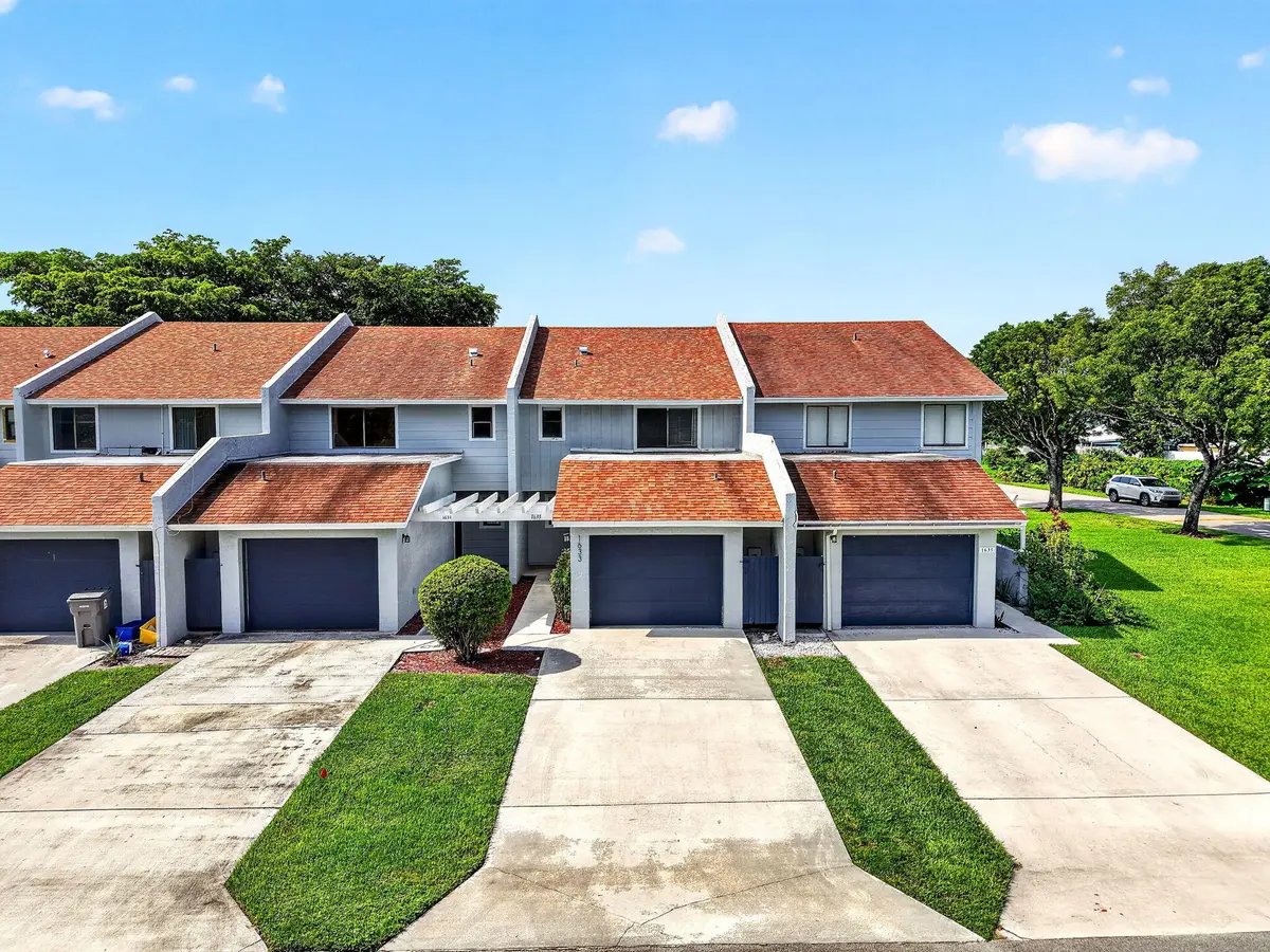Exterior Front at 1633 Woodbridge Lakes Circle 1633, West Palm Beach