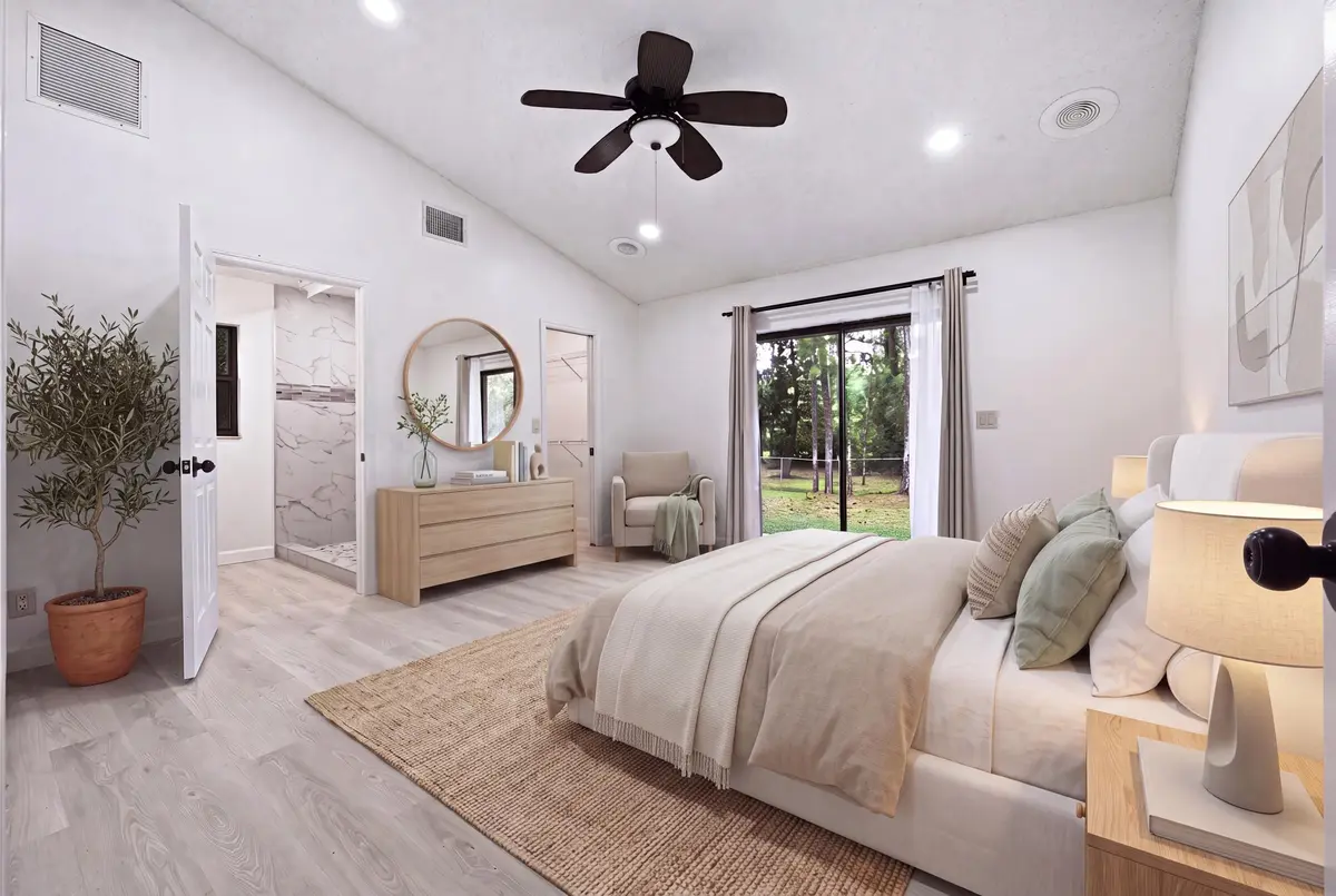 VIRTUAL STAGED PRIMARY BEDROOM at 7380 155TH Place, Palm Beach Gardens