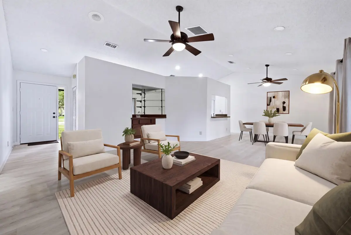 VIRTUAL STAGED LIVING & DINING ROOM at 7380 155TH Place, Palm Beach Gardens
