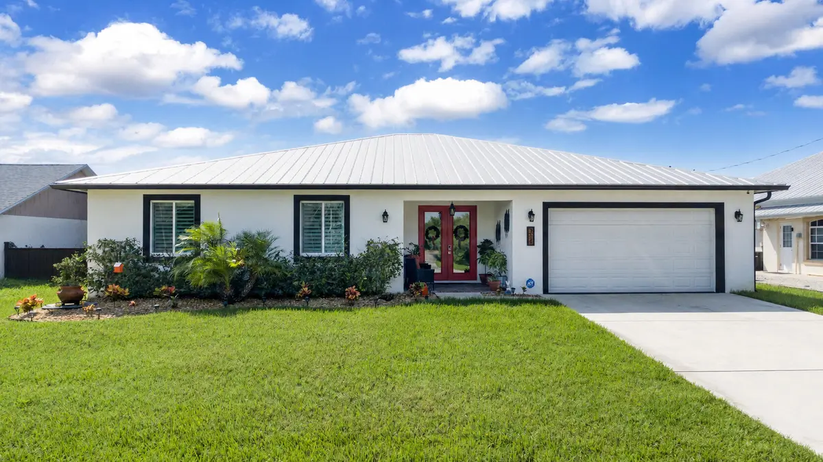 front of house updated at 314 NE Surfside Avenue, Port St. Lucie