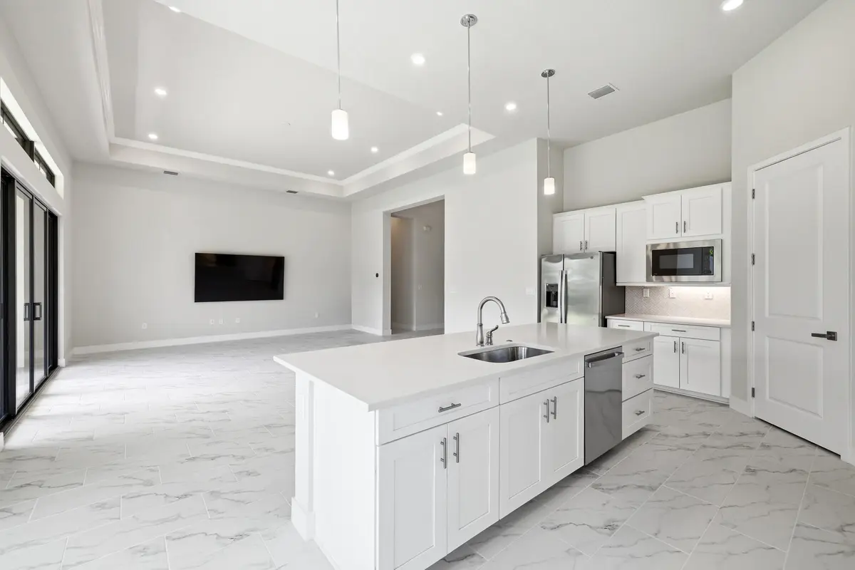 Kitchen/Open Living at 7950 Rowan Terrace, Parkland