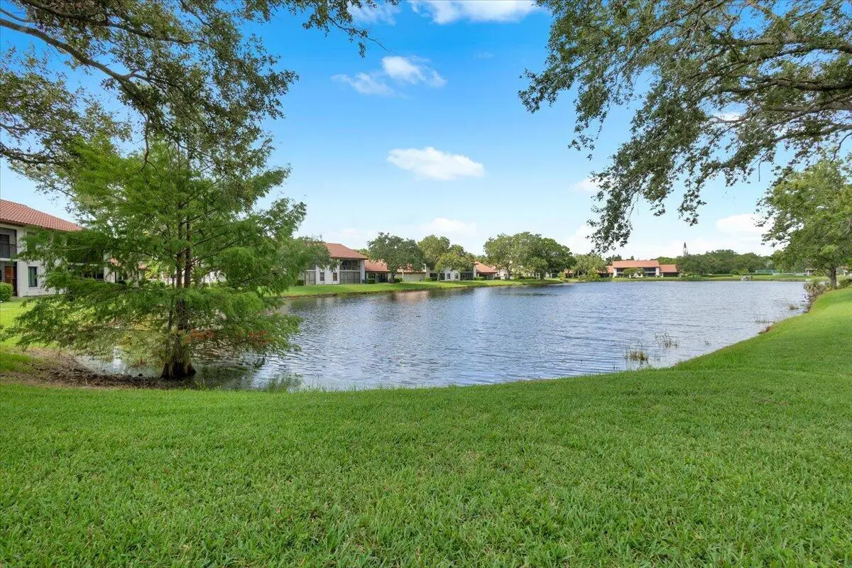 Lake view at 6050 SE Martinique Drive 102, Stuart