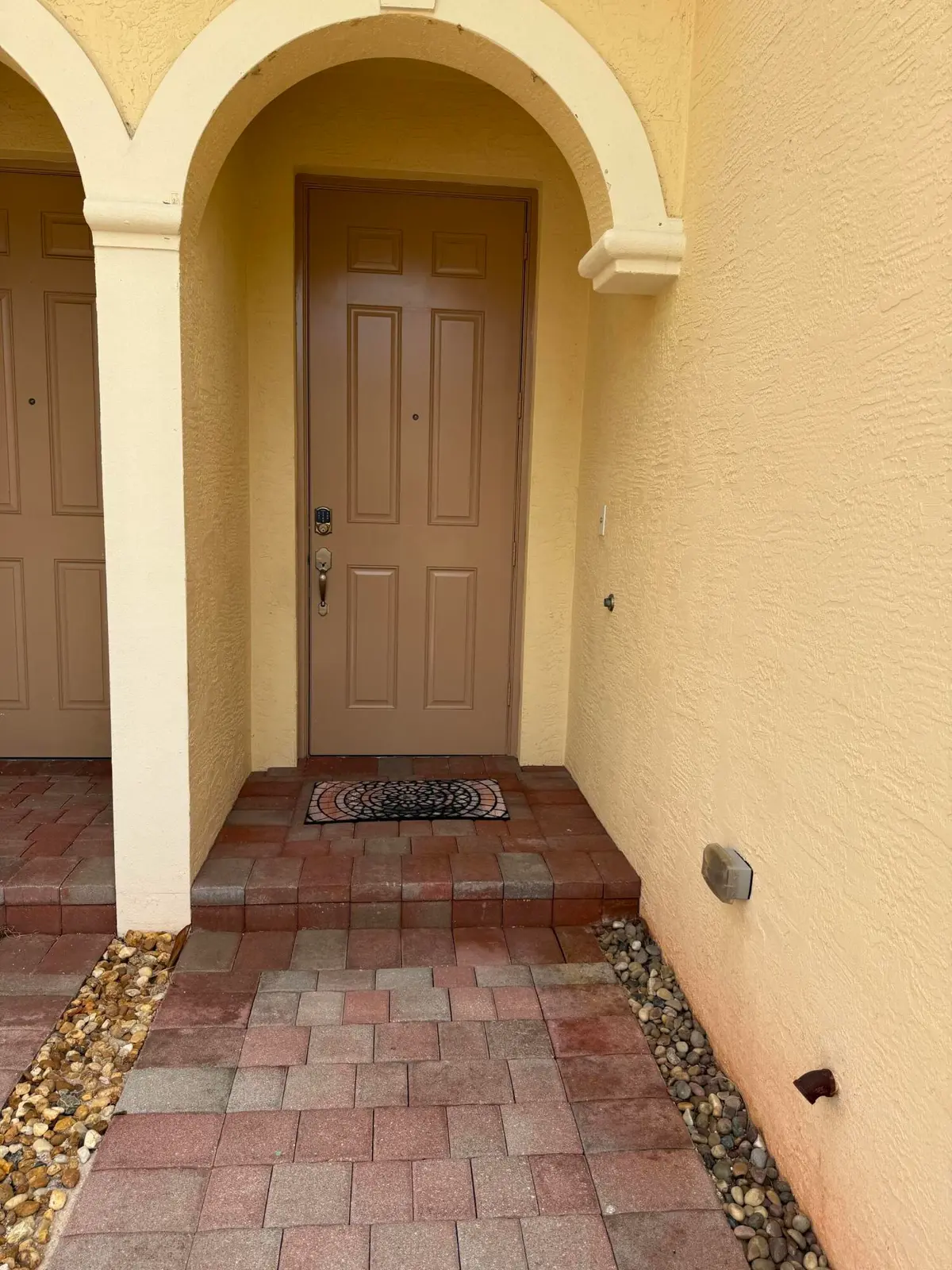 Covered entry at 9519 SW Merlin Court, Stuart
