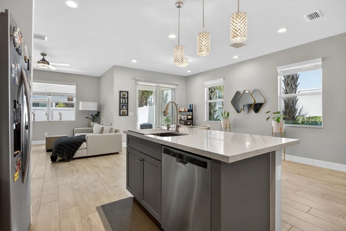Kitchen with open area at 1835 Sandpiper Pointe Place, Deerfield Beach