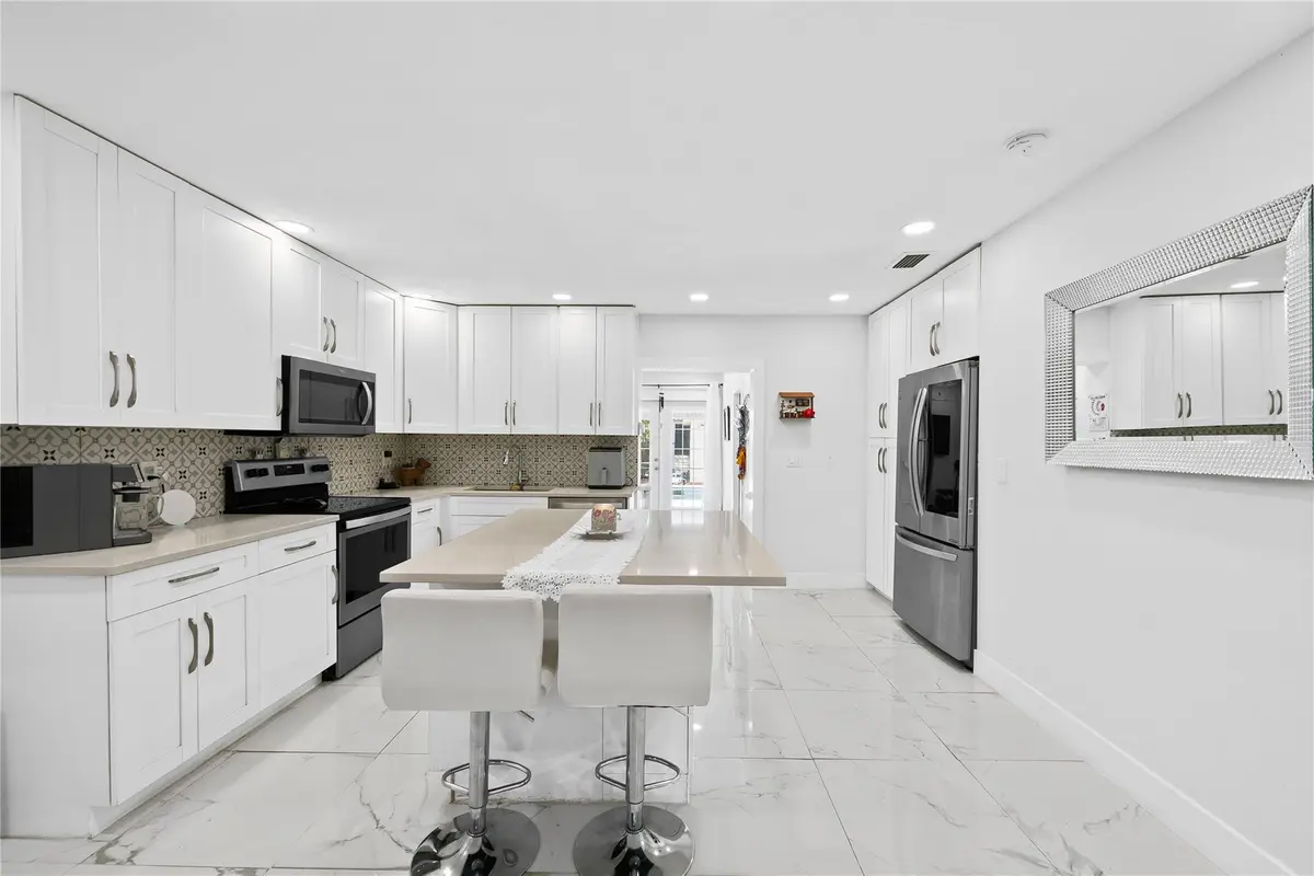 Photo 4 at 4010 CORAL SPRINGS Drive, Coral Springs