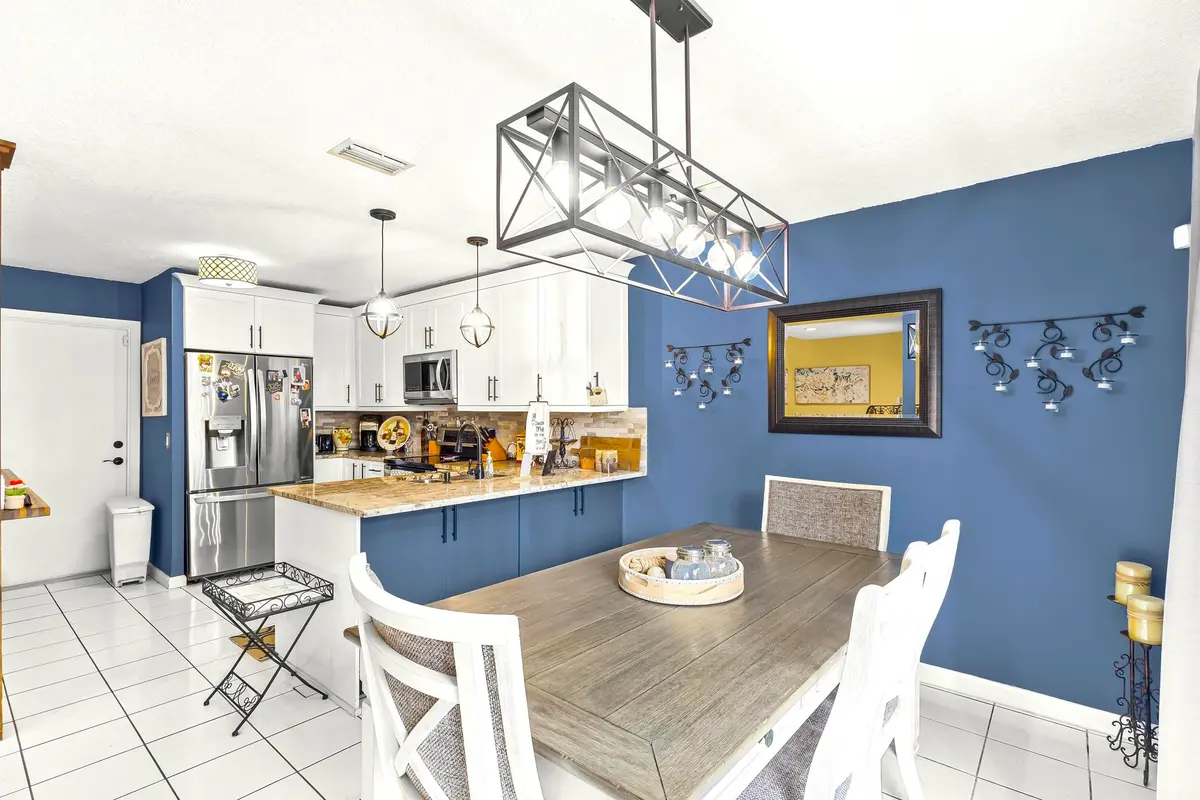 Dining Room + Kitchen at 9871 Watermill Circle D, Boynton Beach