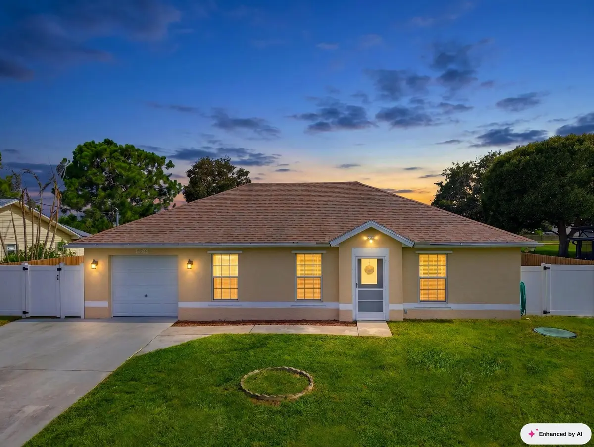 Front Dusk at 5807 NW BURRI Court, Port St. Lucie