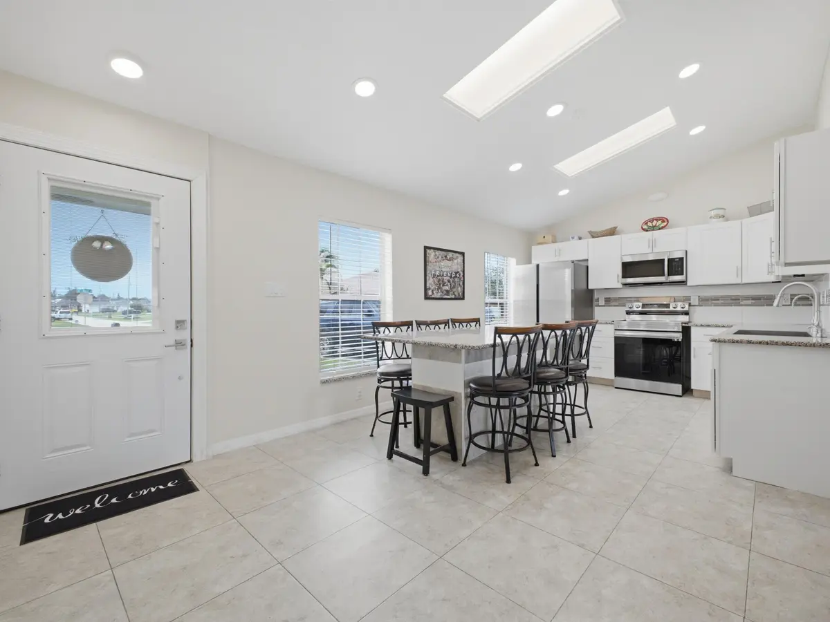 Foyer Dining Kitchen at 5807 NW BURRI Court, Port St. Lucie