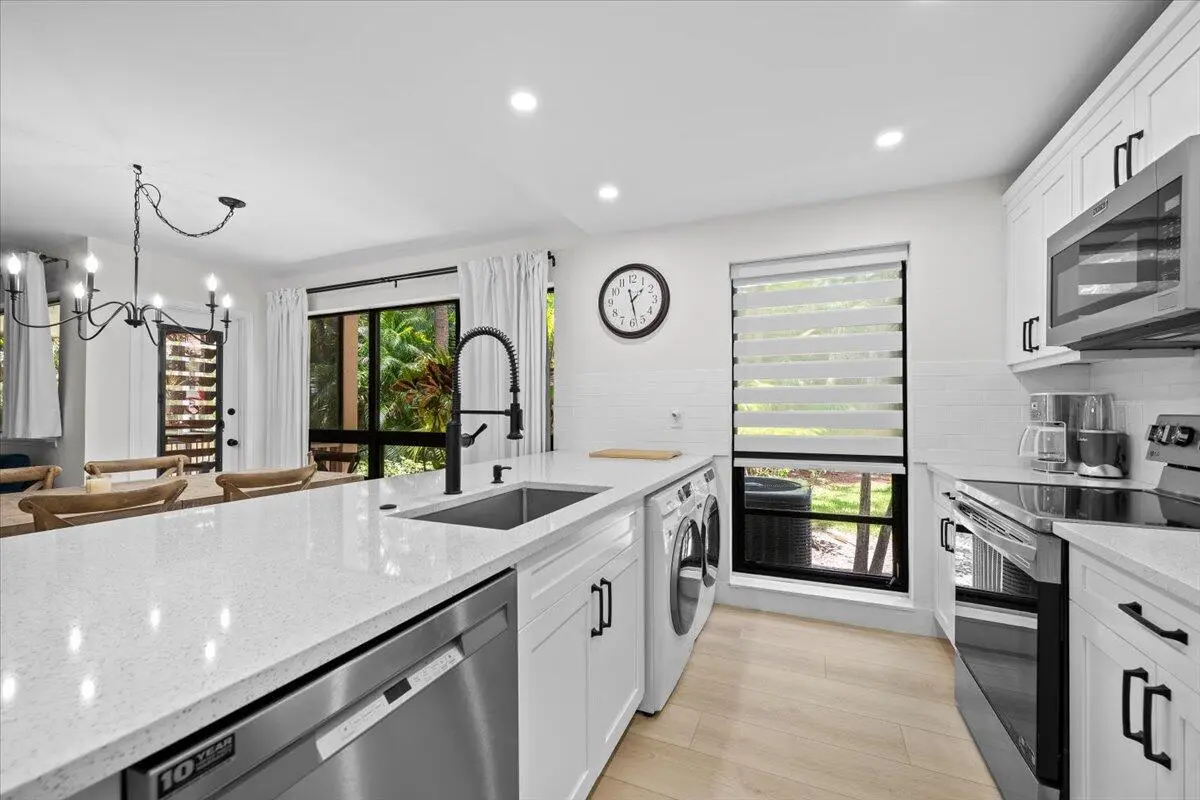 Open Modern Kitchen at 221 Brackenwood Terrace, Palm Beach Gardens
