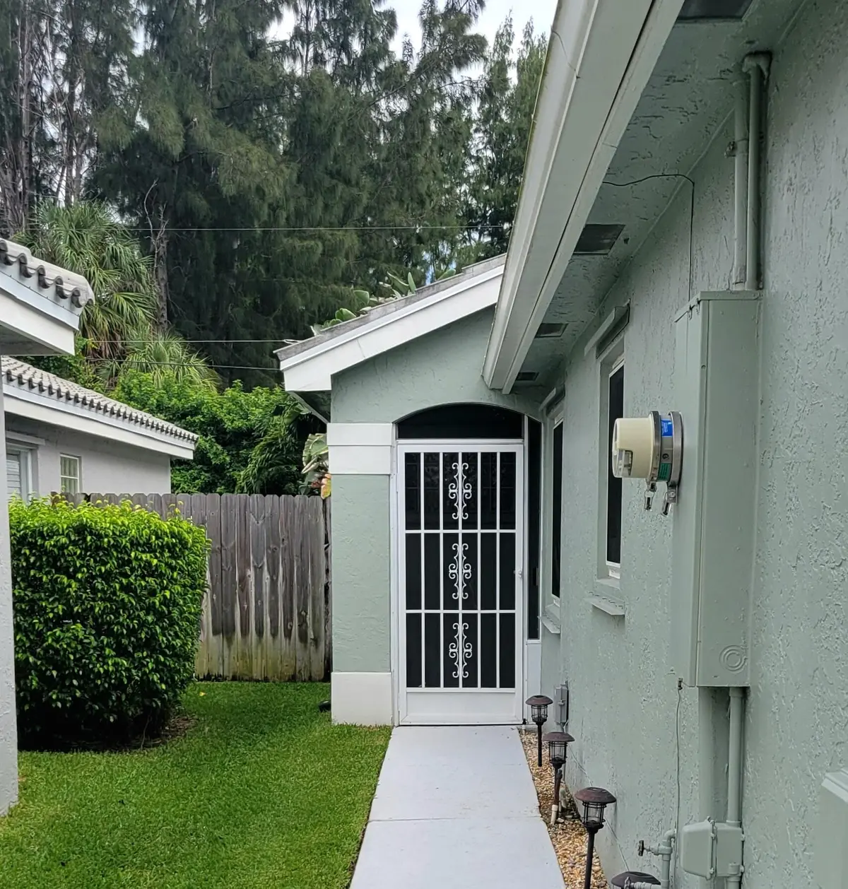 EXTERIOR SIDE ENTRY at 8294 Bermuda Sound Way, Boynton Beach
