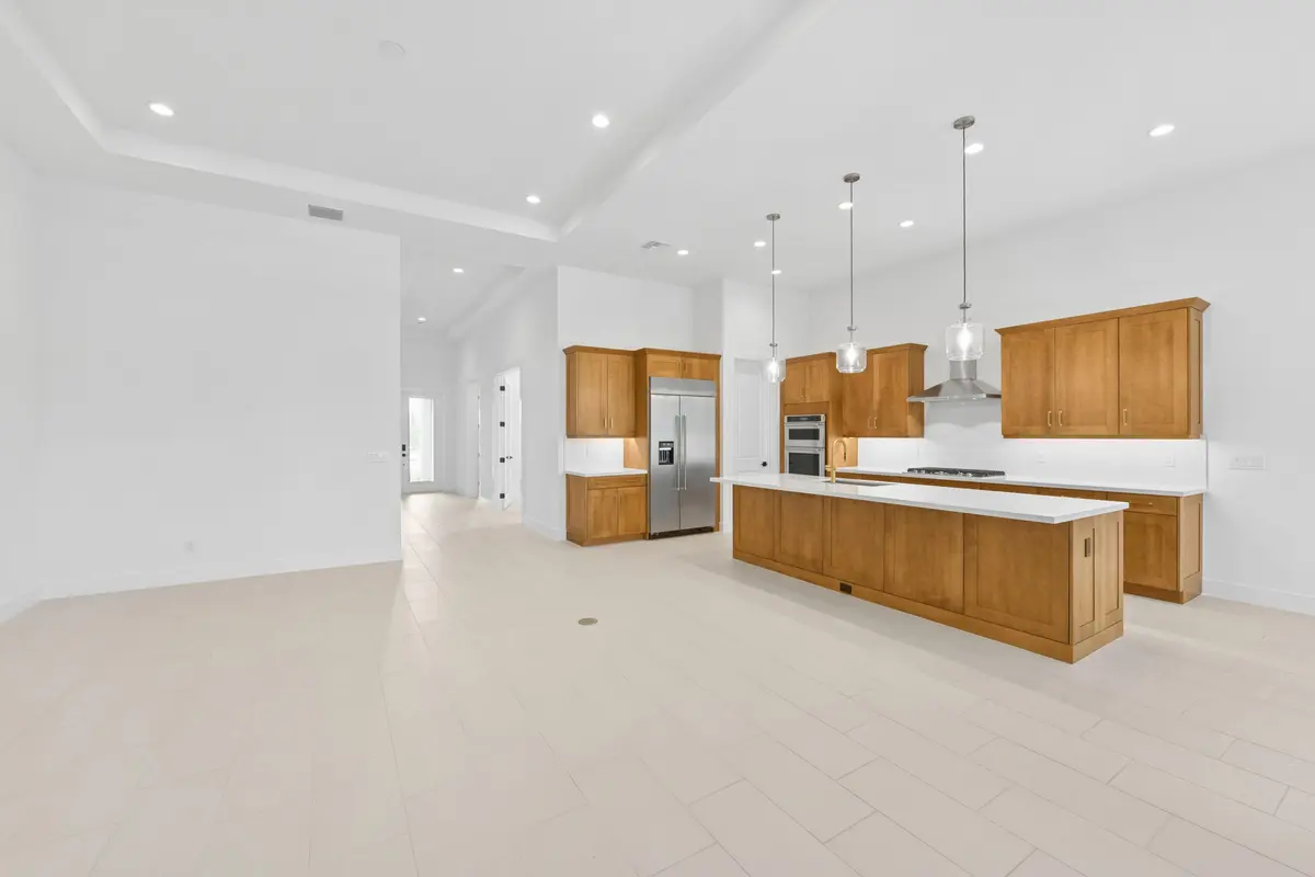 Avenir_JesalinTransition_157_greatroom at 10005 Driftwood Way, Palm Beach Gardens