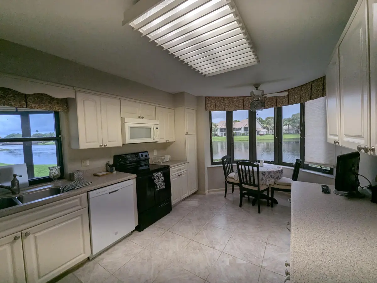 Kitchen at 16941 Waterbend Drive 152, Jupiter