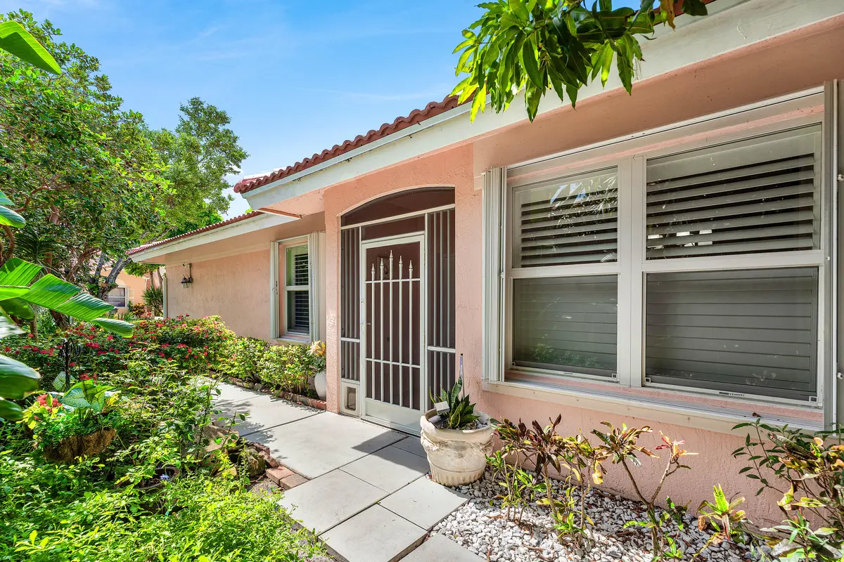 SCREENED ENTRANCE at 315 CORAL TRACE Lane, Delray Beach
