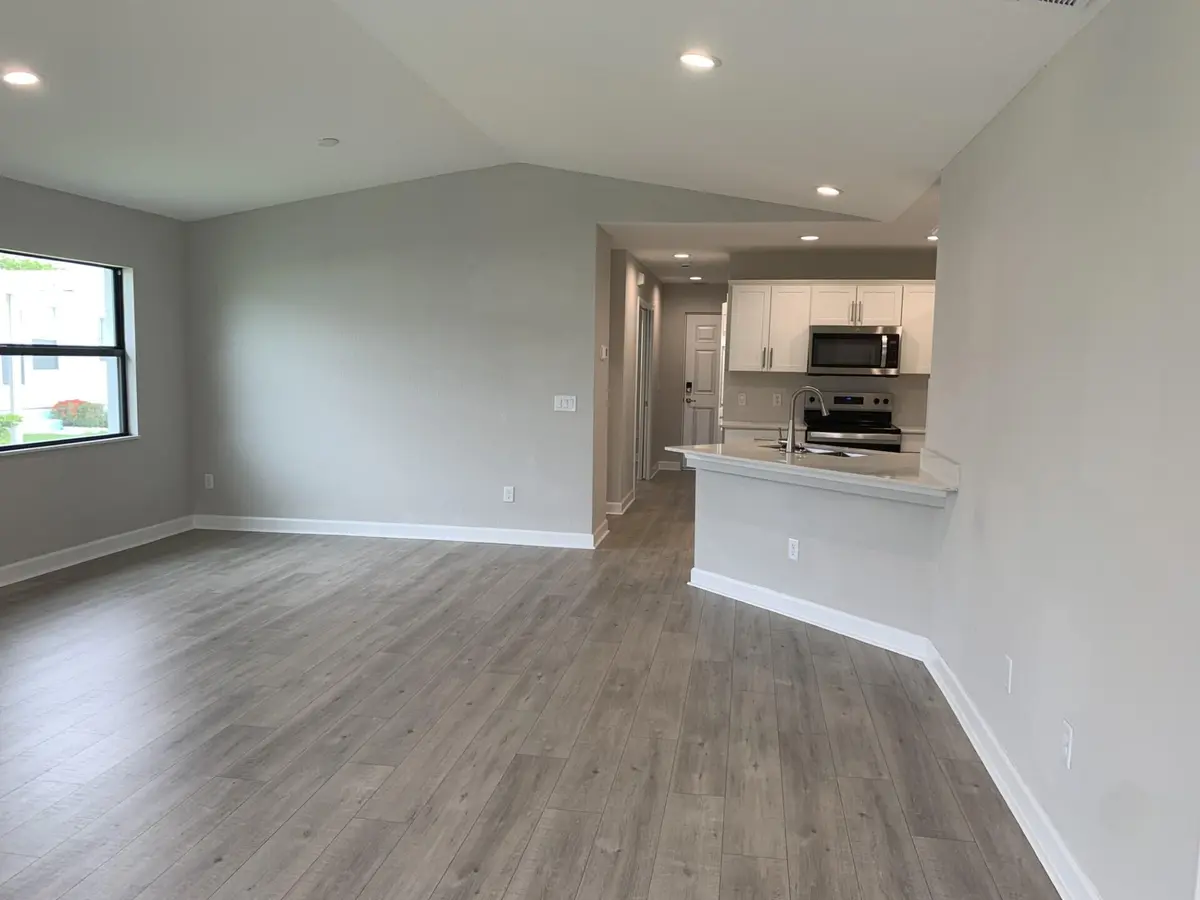 Great Room to Kitchen at 17 EL PORTAL Lane, Port St. Lucie