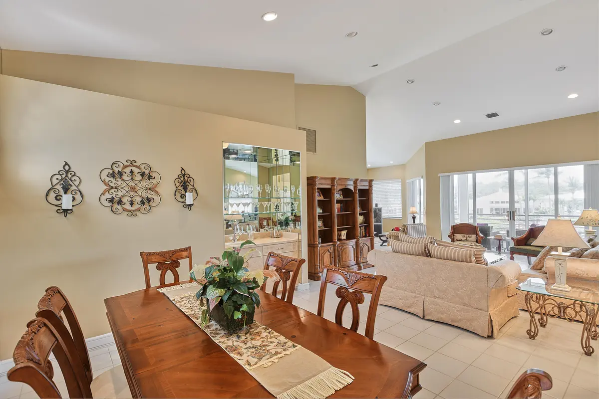 Dining and Living at 392 Spyglass Way, Jupiter
