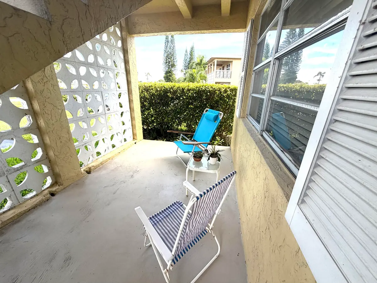 Covered open porch at 1141 VIOLET Terrace 101, Delray Beach