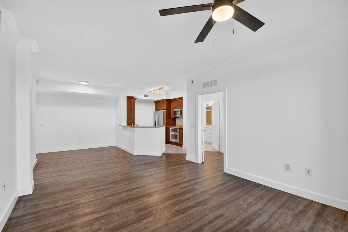 LIVING ROOM TO KITCHEN at 1660 Renaissance Commons Boulevard 2407, Boynton Beach