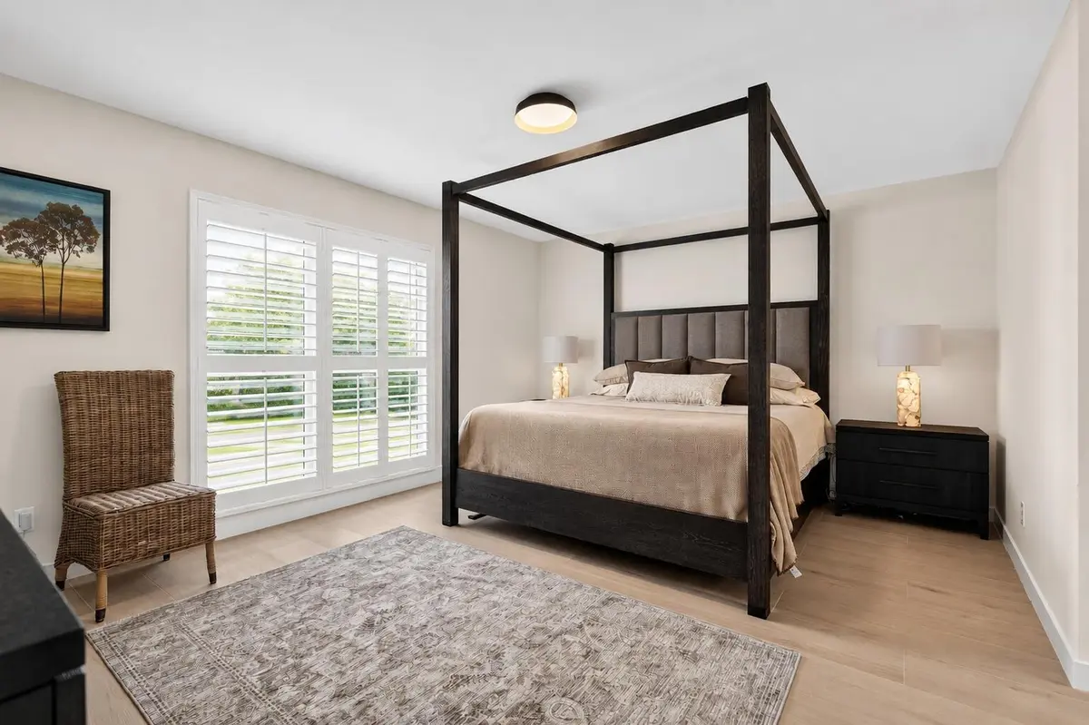 5-print-bedroom_plantation_shades(1) at 302 Brackenwood Circle, Palm Beach Gardens