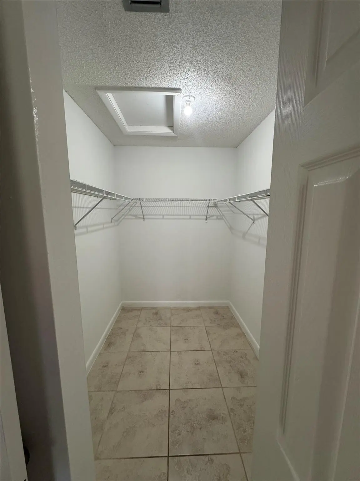 Photo 8 at 445 LAKEVIEW Drive 3, Weston