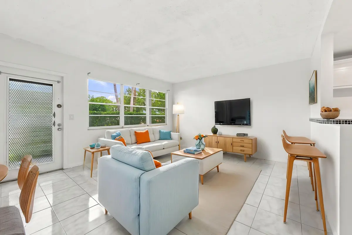 Virtually Staged Living Room at 310 OAKRIDGE R Court 310, Deerfield Beach