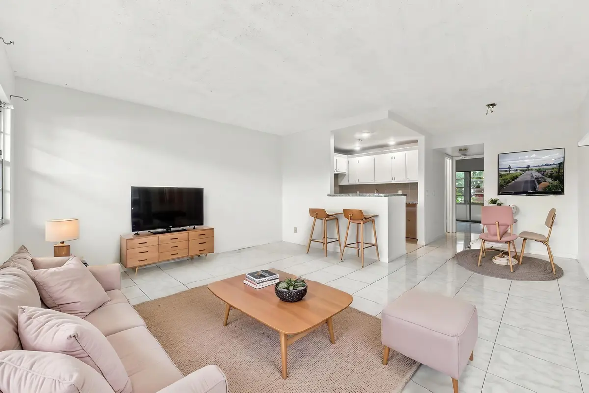 Virtually Staged Living Room at 310 OAKRIDGE R Court 310, Deerfield Beach