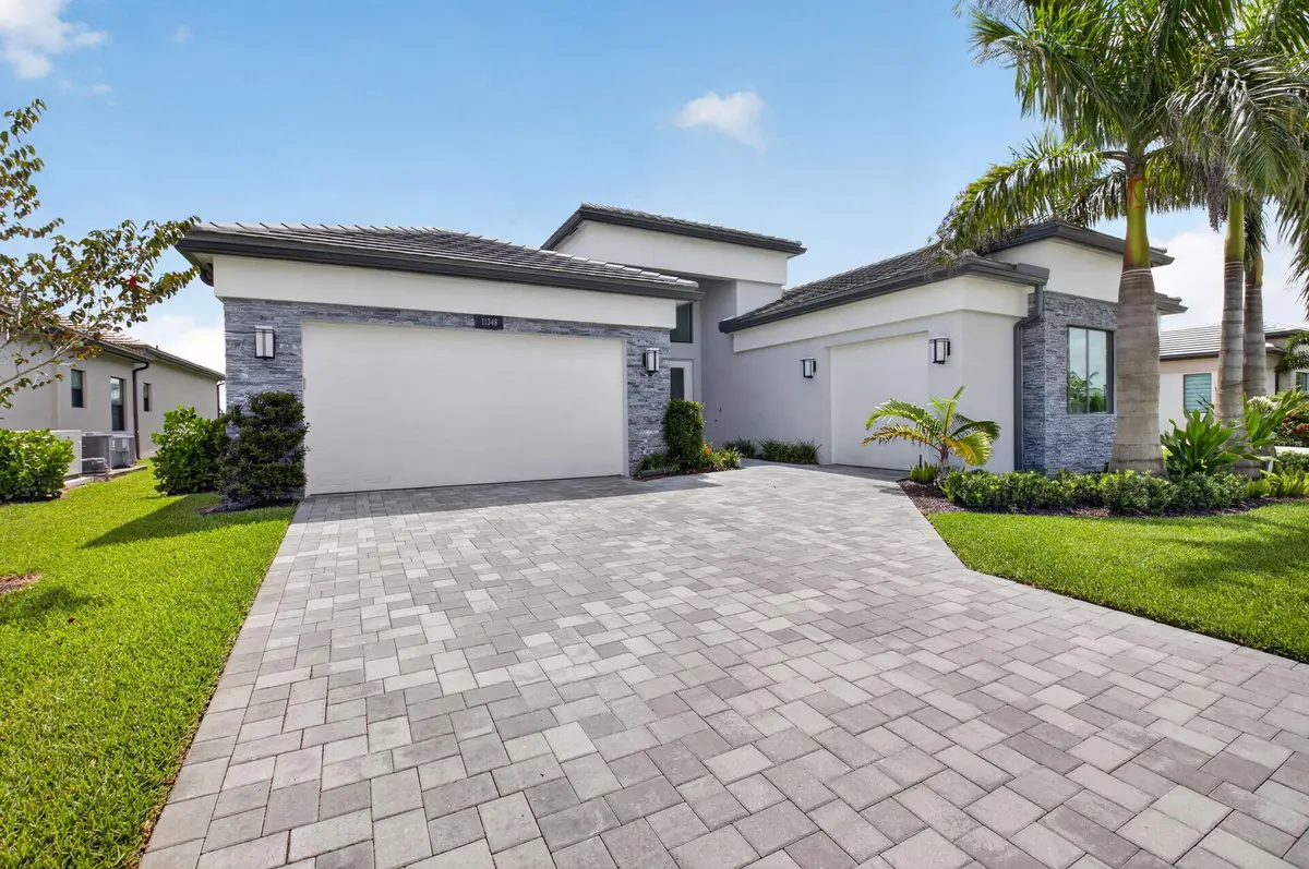 Front Exterior - Lakefront Carmel Model at 11348 Cherry Canyon Court, Boynton Beach