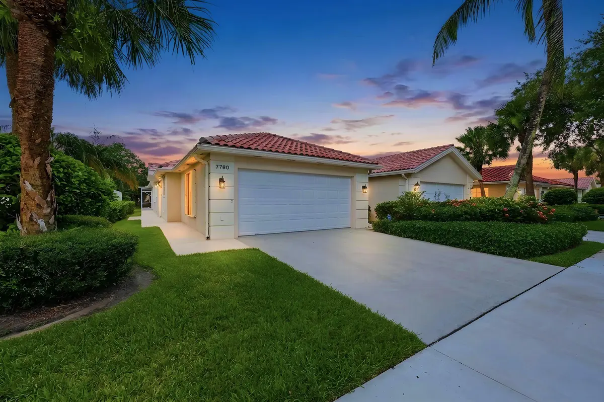 front_ext_34_dusk at 7780 Pine Island Way, West Palm Beach