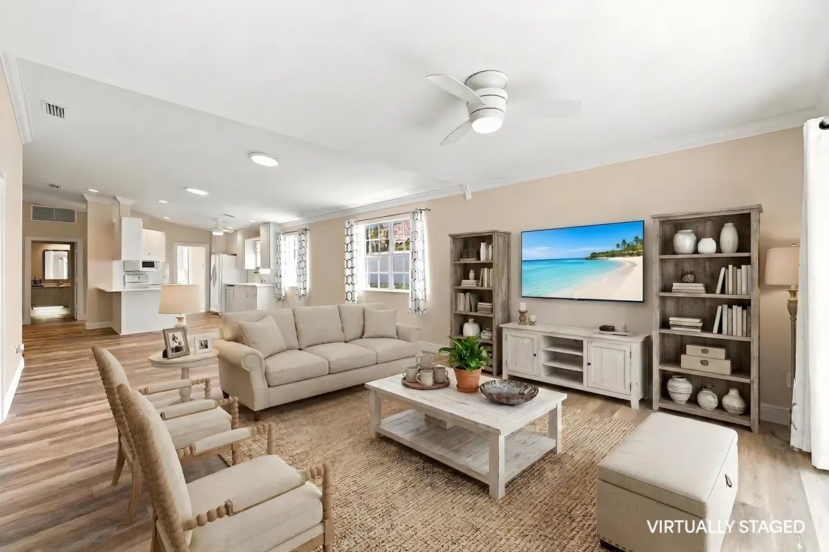 livingroom_alt_staged_disclaimed at 7780 Pine Island Way, West Palm Beach
