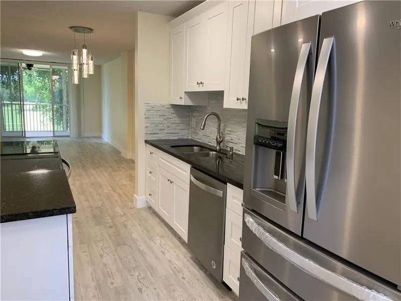 Photo 3 at 250 JACARANDA Drive 203, Plantation