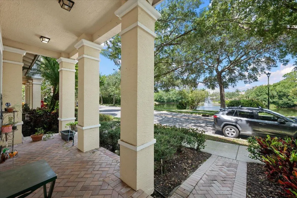 Water Front Covered Porch at 335 E Thatch Palm Circle 104, Jupiter