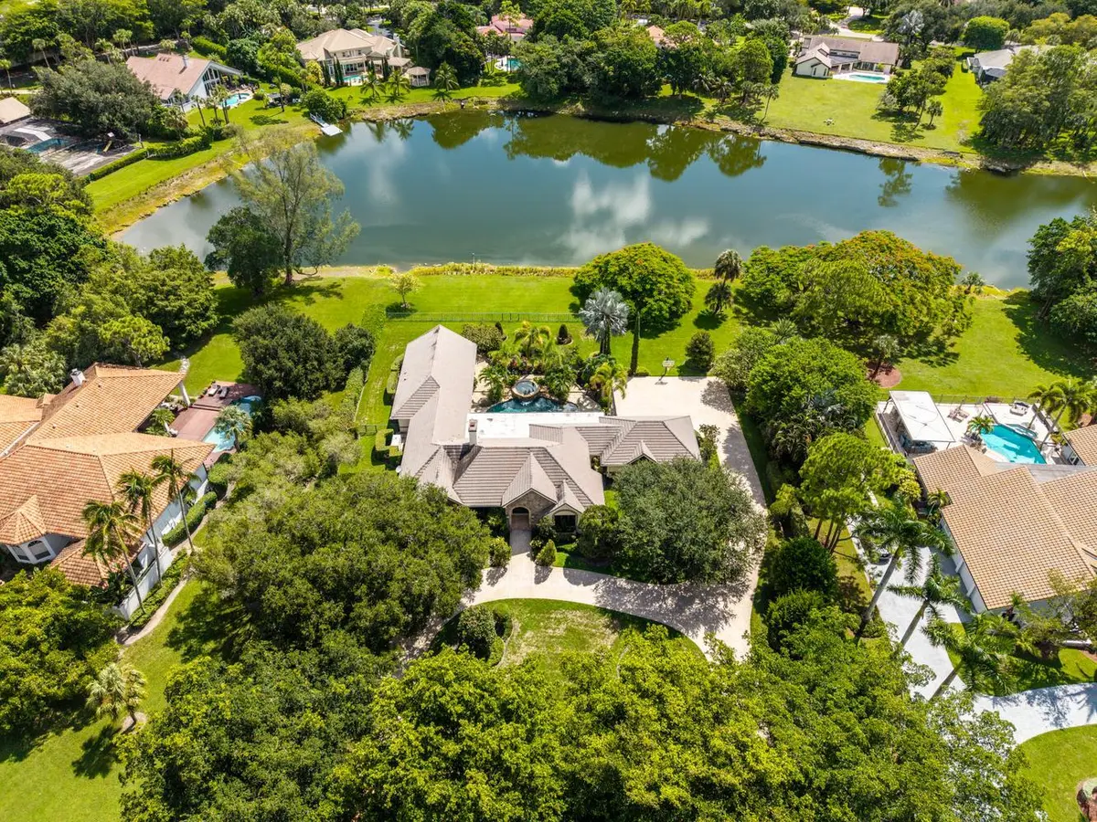 005-007-Exterior Front-1334x1000 at 5591 W Leitner Drive, Coral Springs