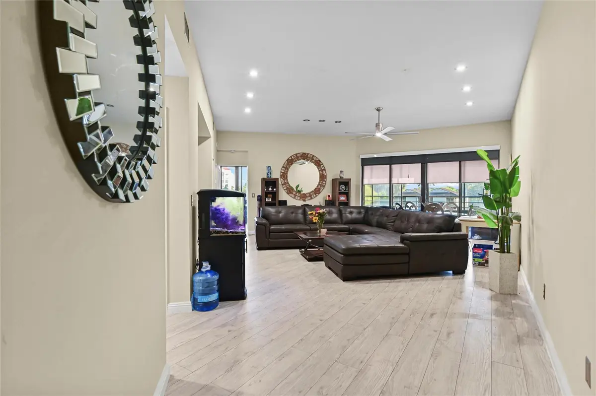 Foyer entry wood style flooring thru-out at 7520 La Paz Boulevard 306, Boca Raton