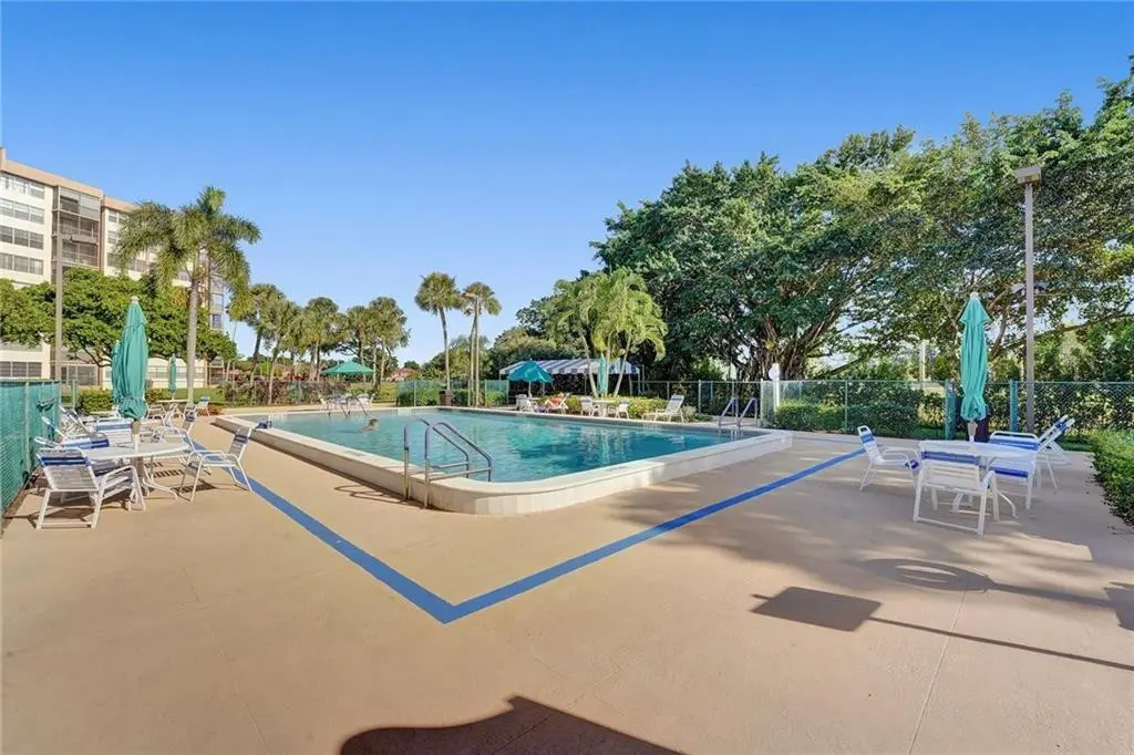 swimming pool at 1100 SAINT CHARLES Place 313, Pembroke Pines
