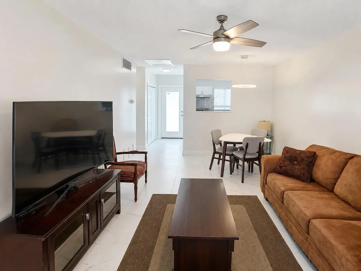 07_living_room_tv_view at 1115 Lake Terrace 208, Boynton Beach
