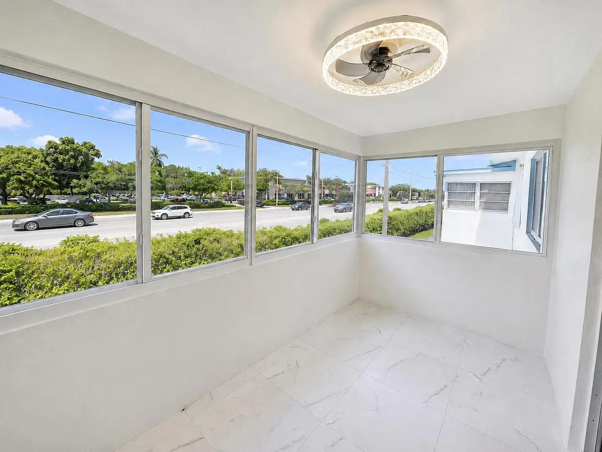 02_sunroom_corner_view at 1115 Lake Terrace 208, Boynton Beach